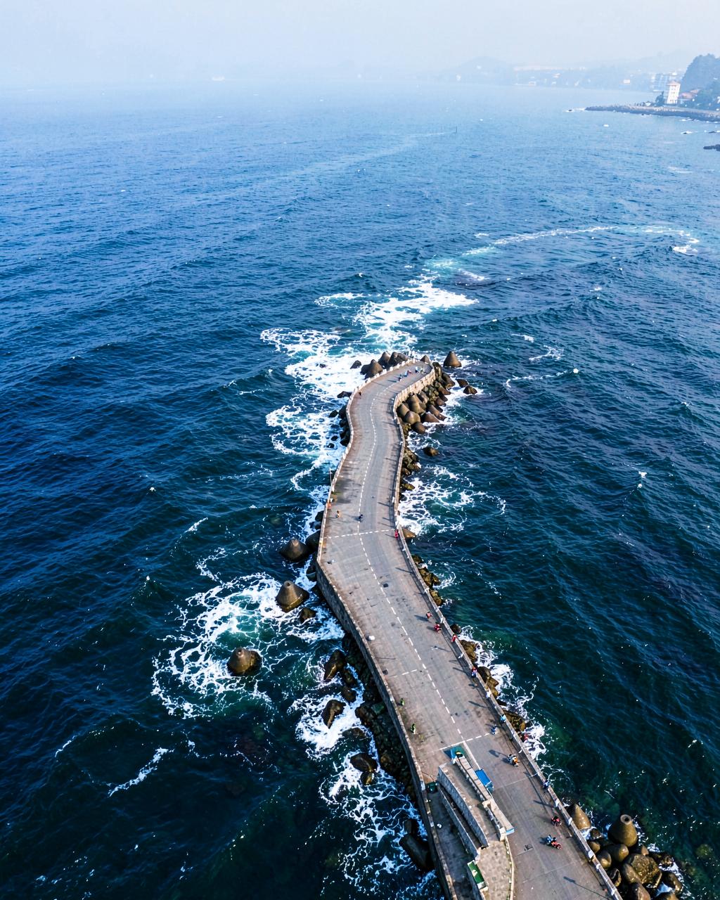 Aerial view of the coastal promenade and blue sea